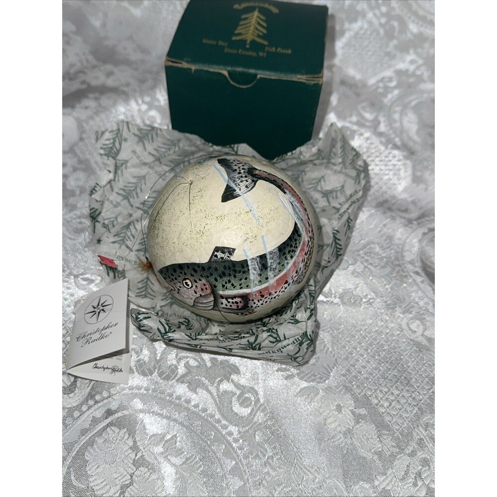 Fishing hand-painted round ball ornament features a detailed Fish